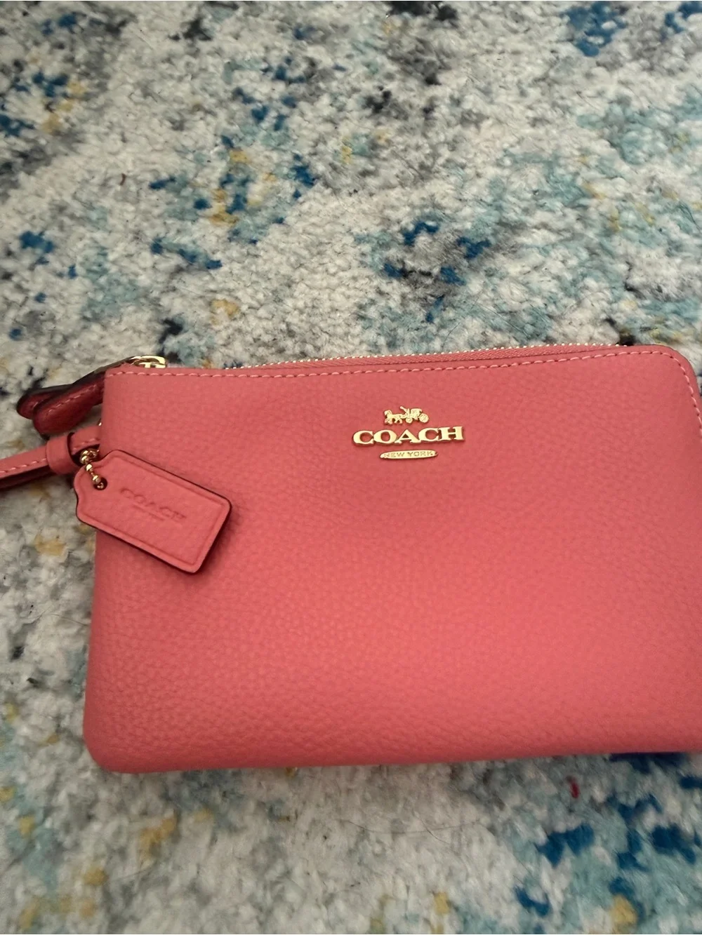 COACH Pebbled Leather Wristlet in Rose Pink with Gold Logo